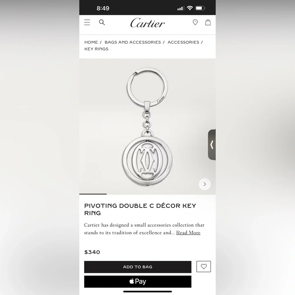 Cartier Silvertone stainless steel pivoting Double C key ring